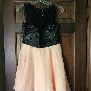 Black mesh/leather top with peach/coral bottoms